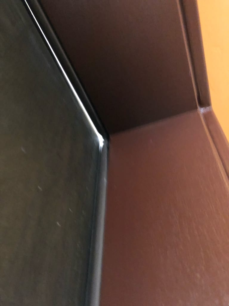 Sunlight coming through at the top of the door, where the jamb and weatherstrip are not sealing. UTS ServicePros field photo.